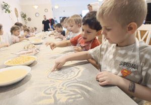 "Jak powstaje pizza?" - czyli kulinarne warsztaty w gr. XII